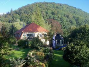 a house in the middle of a mountain at Holiday apartment with 1 bedroom in Furth im Wald