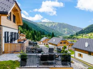 a balcony with a view of the mountains at Chalet Hirschblick in Donnersbachwald