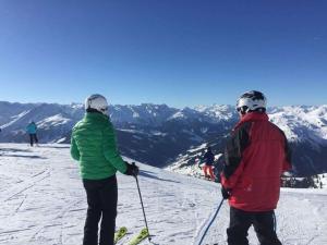 a group of people standing on top of a ski slope at Holiday apartment with 1 bedroom in Königsleiten