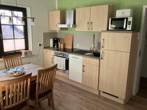 Η κουζίνα ή μικρή κουζίνα στο Holiday apartment with 1 bedroom