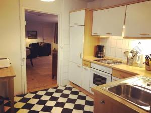 Η κουζίνα ή μικρή κουζίνα στο 2 at Lake Ruppin