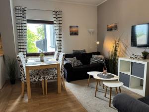 Гостиная зона в Holiday apartment with 1 bedroom