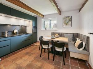 Kuchyň nebo kuchyňský kout v ubytování Holiday home in Göhl with swimming pool