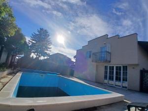 Bazén v ubytování Villa Atlantis nebo v jeho okolí + 14 fotografií