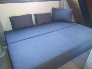 En eller flere senge i et værelse på Holiday home with 1 bedroom + 29 billeder