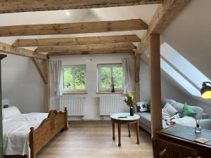 Ένα ή περισσότερα κρεβάτια σε δωμάτιο στο Little Green Basedow