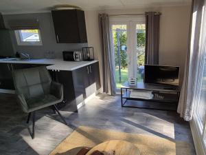 Køkken eller tekøkken på The Veluwse Forest Cottage