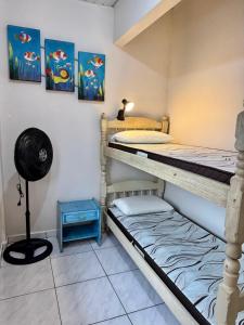 En eller flere senge i et værelse på Perfect Beach House for your Vacation