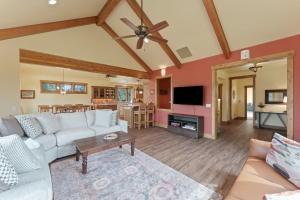 a living room with a couch and a table at High Lowe in Bend +53 photos
