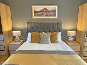 Ένα ή περισσότερα κρεβάτια σε δωμάτιο στο Riverview Lodge