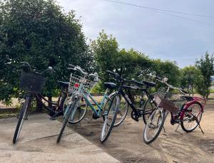 a group of bikes parked next to each other at 瀬戸内庵Setouchian in Takamatsu