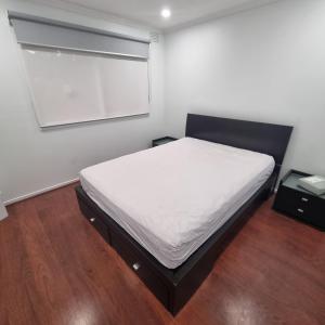 Ένα ή περισσότερα κρεβάτια σε δωμάτιο στο Park Villa in Mulgrave