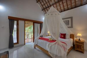 Postel nebo postele na pokoji v ubytování NG Sweet Home