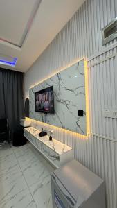 TV a/nebo společenská místnost v ubytování TW-Residence