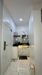 Kuchyň nebo kuchyňský kout v ubytování TW-Residence + 45 fotografií