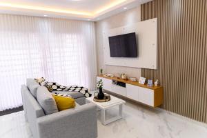 TV a/nebo společenská místnost v ubytování Jare Residence