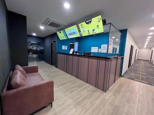 TV a/nebo společenská místnost v ubytování Seeds Hotel PV12