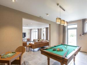 a living room with a pool table at Luxury Stay La Croix Scaille in Bourseigne-Neuve