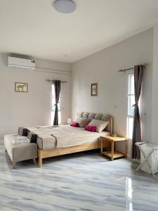 Ένα ή περισσότερα κρεβάτια σε δωμάτιο στο Private home