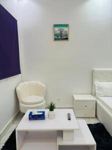 Postel nebo postele na pokoji v ubytování RESIDENCE EL HADJI ANNEXE - les Mamelles