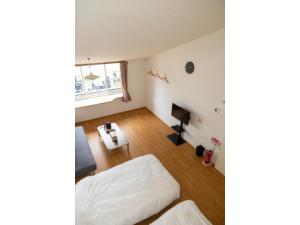 Postel nebo postele na pokoji v ubytování Beach Front Litore Iritahama - Vacation STAY 76446v