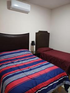 Postel nebo postele na pokoji v ubytování Casa El Encanto