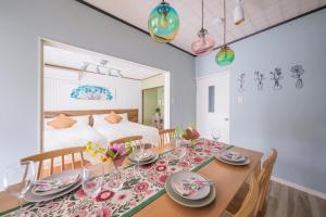 En eller flere senge i et værelse på Sen no Yado Nagashima Nagoya