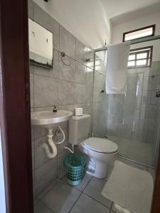 Koupelna v ubytování Apartamentos completos no centro - vista mar