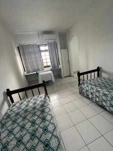 Postel nebo postele na pokoji v ubytování Pousada azul