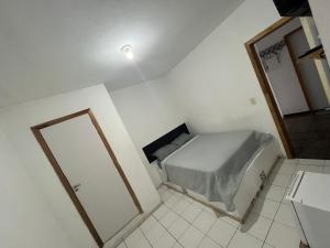 Postel nebo postele na pokoji v ubytování Pousada azul + 1 fotografie