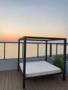 Кровать или кровати в номере Bello apartamento en edificio Vivo Costanera Frente a la playa! Con Parking +24 фотографии