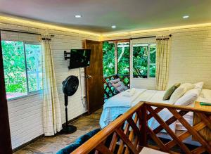 Et tv og/eller underholdning på APARTAMENTO MINCA SUITE In