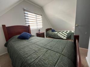 Postel nebo postele na pokoji v ubytování Casa San Pedro de la Paz