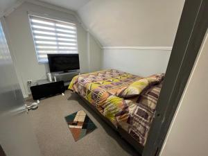 TV a/nebo společenská místnost v ubytování Casa San Pedro de la Paz