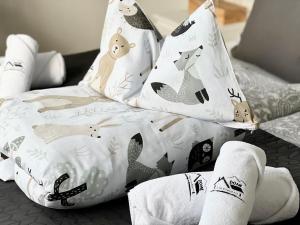 Кровать или кровати в номере Villa in Doksy near Macha Lake