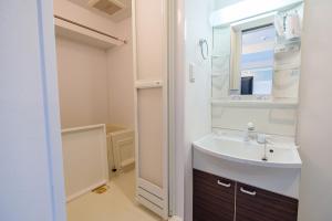 Koupelna v ubytování Great ocean views! AMS 海宝楼 + 22 fotografií