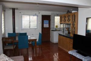 Kuchyň nebo kuchyňský kout v ubytování Cabaña y Hostal Dr Steffens