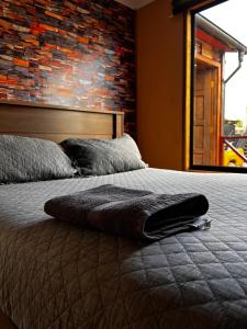 Ένα ή περισσότερα κρεβάτια σε δωμάτιο στο Apartamentos Natales May 21