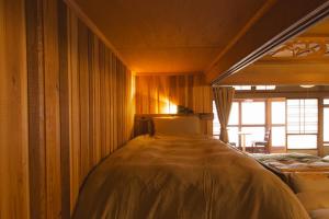 Кровать или кровати в номере ニュー檸檬樹