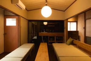 Кровать или кровати в номере ニュー檸檬樹