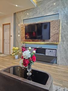 Et tv og/eller underholdning på M&M Rooftop Pattaya