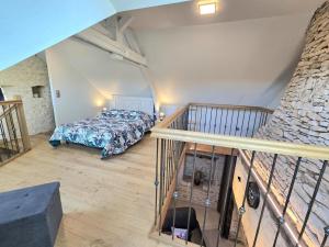 Ένα ή περισσότερα κρεβάτια σε δωμάτιο στο Maison cosy pour couple avec spa privé en Périgord - FR-1-616-507