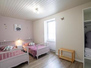 Ένα ή περισσότερα κρεβάτια σε δωμάτιο στο Maison périgourdine avec piscine chauffée et WiFi - FR-1-616-518