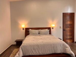 Ένα ή περισσότερα κρεβάτια σε δωμάτιο στο Chial Villa 16 Overlooking San Ignacio Mountains