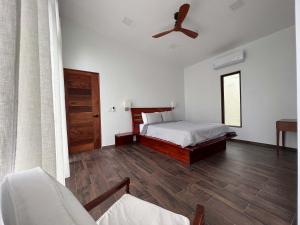 Ένα ή περισσότερα κρεβάτια σε δωμάτιο στο Chial Villa 16 Overlooking San Ignacio Mountains +8 φωτογραφίες