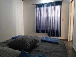 Postel nebo postele na pokoji v ubytování Complejo Cruce Varela