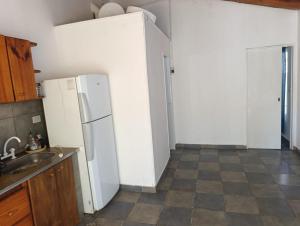 Kuchyň nebo kuchyňský kout v ubytování Complejo Cruce Varela