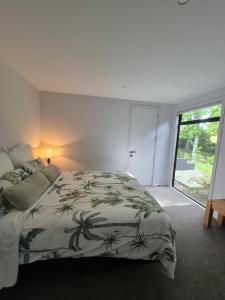 Giường trong phòng chung tại Country Space in Richmond