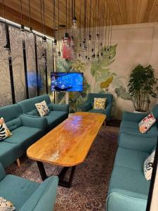 O zonă de relaxare la Tanan Center Serviced Apartments +19 fotografii