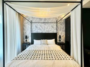 En eller flere senge i et værelse på BlueDream